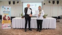 Direktur Bethsaida Hospital Serang, dr. Tirtamulya Juandy bersama Kepala Disdukcapil Kabupaten Serang, Warnerry Poetri usai penandatanganan kerjasama.